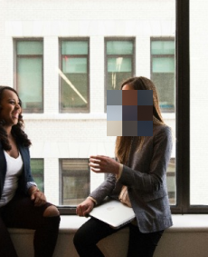 Blurred faces women talking