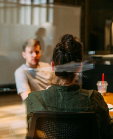 People sitting at conference table