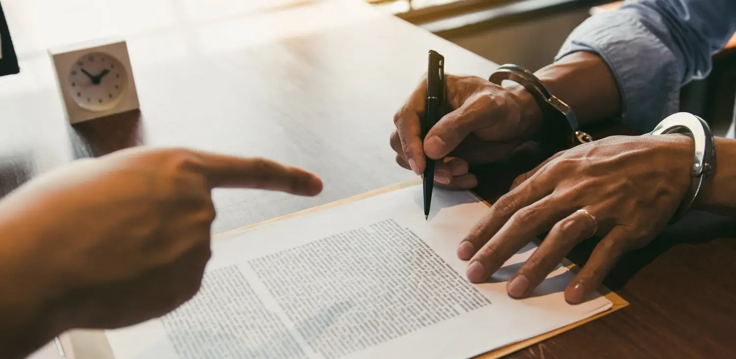 police-pointed-to-the-document-for-the-suspect-to-2021-08-31-11-51-33-utc